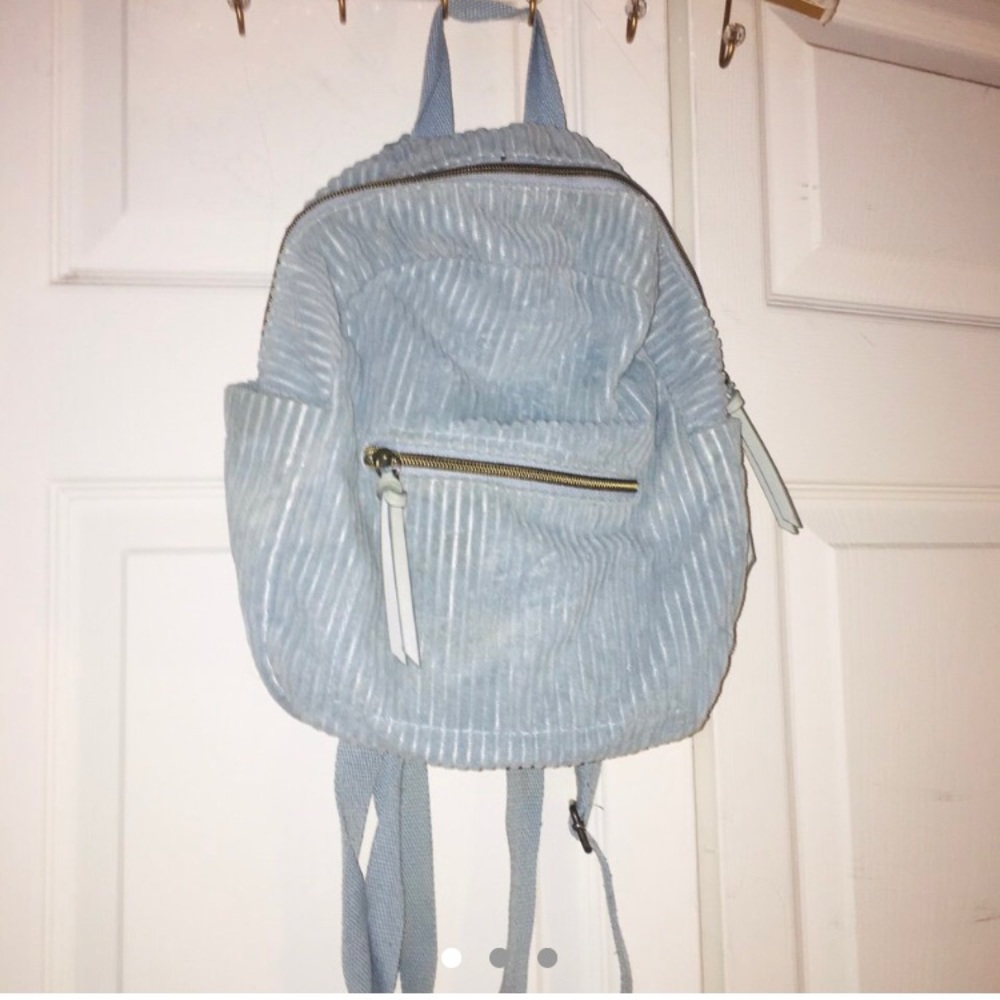 Blue mini backpack.